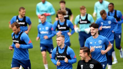 West Ham's Jarrod Bowen and Declan Rice training with teammates. PA