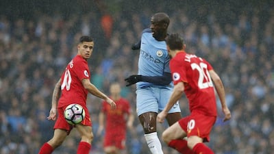 Yaya Toure, centre, in action for Manchester City against Liverpool in the 1-1 Premier League draw on Sunday. Andrew Yates / Reuters