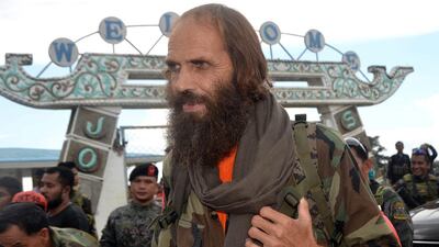 Released Norwegian hostage Kjartan Sekkingstad boards a plane on Jolo island in the southern Philippines after he was freed by Abu Sayyaf extremists from a year of jungle captivity on September 18, 2016. AP Photo/Nickee Butlangan
