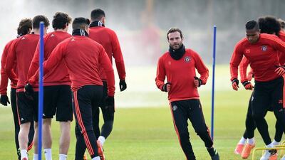 Manchester United’s Spanish midfielder Juan Mata (C) takes part in a team training session at their Carrington Training Centre in Manchester, north west England on March 16, 2016 ahead of their Uefa Europa League second leg football match against Liverpool. AFP / Paul ELLIS
