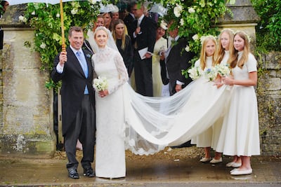 Sperling, who arrived with three bridesmaids, wore a gown by British designer Emilia Wickstead. PA Wire