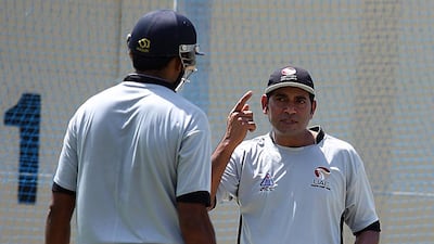 Aaqib Javed, right, the UAE coach, was annoyed with the way the Under 19 team played during their defeat to Pakistan on Monday. Satish Kumar / The National