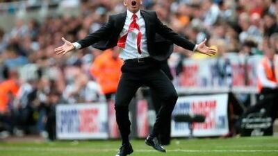 TOPSHOTS Sunderland's Italian manager Paolo Di Canio celebrates after his team scored the first goal against Newcastle. Ian Macnicol / AFP