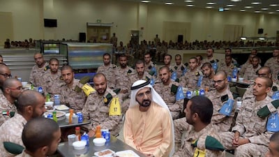 Sheikh Mohammed bin Rashid, Vice President and Ruler of Dubai has iftar with National Service Recruits at the National Service School of Presidential Guard at Seih Hafair Camp. Courtesy Dubai Media Office