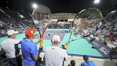 Abu Dhabi, United Arab Emirates - Reporter: Jon Turner: Fans with giant rackets during the final between Rafael Nadal v Stefanos Tsitsipas at the Mubadala World Tennis Championship. Saturday, December 21st, 2019. Zayed Sports City, Abu Dhabi. Chris Whiteoak / The National