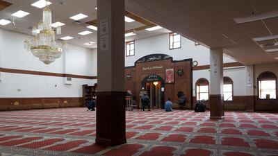 Imam Magdy Badr leads prayers over a live broadcast on a laptop in a nearly empty room at Masjid Al Salaam mosque on the first full day of Ramada on April 24, 2020 in Dearborn, Michigan. Getty Images via AFP