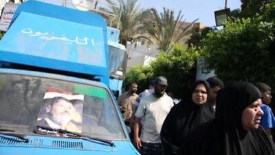 The blue broadcast truck of Egypt's state television, “borrowed” by banned Islamist channels to send news of their sit-in from the Rabaa Al Adawiya mosque in Cairo.