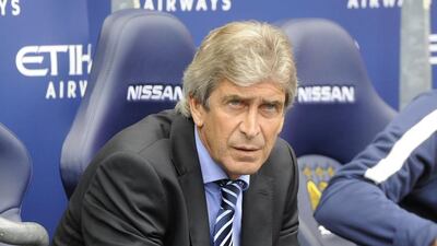 Manuel Pellegrini is very bright and has interests beyond football, says Diego Forlan, who played for the Manchester City manager while they both were at Villarreal. Pellegrini is not as boring as English media sometimes suggest. Philip Richards / EPA