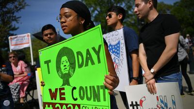 Demonstrators rally at the US Supreme Court in Washington DC to protest a proposal to add a citizenship question in the 2020 Census. AFP / Mandel Ngan