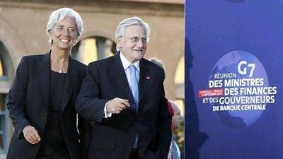 The IMF director Christine Lagarde and the European Central Bank president Jean-Claude Trichet joined the two-day summit in France. Jean-Paul Pelissier / Reuters
