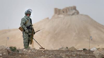 A Russian army sapper works at the historic part of Palmyra, Syria, on April 9, 2016. REUTERS/Russian Ministry of Defence