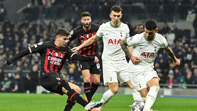 AC Milan's Brahim Diaz has a shot blocked by Tottenham defender Cristian Romero. AFP