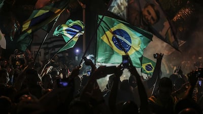 Supporters of Jair Bolsonaro celebrate his victory in Rio de Janeiro. EPA