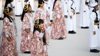 Emirati girls and boys perform at the parade in Al Wathba. Eissa Al Hammadi for the Presidential Court