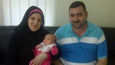 Baby Lailas reunited with her parents after her ordeal. Courtesy Sharjah Police Department