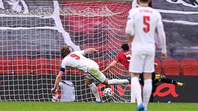 Harry Kane of England scores their side's first goal against Albania. Getty