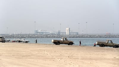 There was no sign of a fire or damage to Fujairah Port or vessels anchored off the coast on Sunday. Pawan Singh / The National