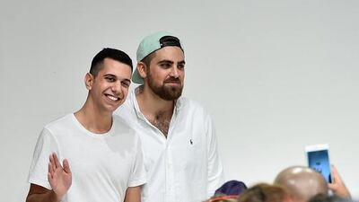 Riccardo Audisio, left, and Yago Goicoechea greet the crowd after the Taller Marmo show during Dubai Fashion Forward Spring/Summer 2016 at Madinat Jumeirah. Pascal Le Segretain / Getty Images for Fashion Forward