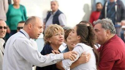 Relatives of Turkish soldiers react after a court decision in Silivri on Friday in the two-year-long trial of 365 defendants including retired and active army officers accused of plotting to overthrow the Turkish government in 2003.