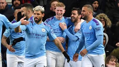 Manchester City's Belgian midfielder Kevin De Bruyne celebrates with teammates after scoring their second goal in the Premier League match against West Ham United at the Etihad. AFP