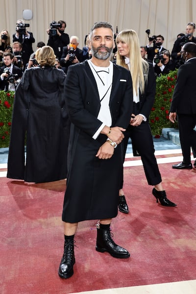 Oscar Isaac wearing Thom Browne on the Met Gala 2022 red carpet. AFP