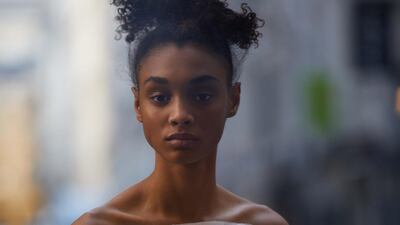 Imperial Lilies off-white belted dress with a tulip-shaped skirt with organza embroidery and a tulle bust with organza lilies, Azzi & Osta Haute Couture.
