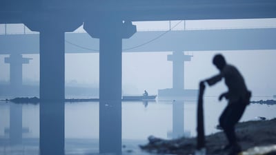 A man washes his clothein the Yamuna River in New Delhi. Adnan Abidi / Reuters