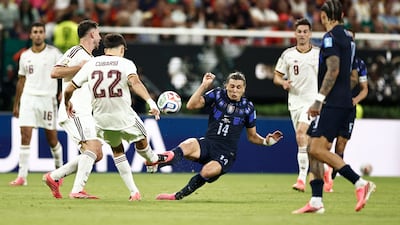 Spain's defender #22 Pau Cubarsi and Uruguay's forward #14 Agustin Canobbio fight for the ball during the 2026 World Cup Group H football match between Uruguay and Spain at the Guadalajara Stadium in Zapopan. AFP