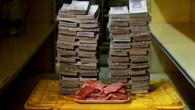A kilogram of meat is pictured next to 9,500,000 bolivars