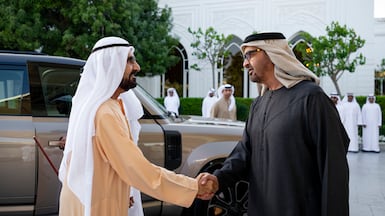 President Sheikh Mohamed greets Sheikh Mohammed bin Rashid, Vice President, Prime Minister and Ruler of Dubai, at Qasr al Bahr. Photo: UAE Presidential Court