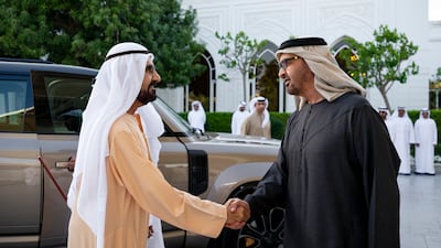 President Sheikh Mohamed greets Sheikh Mohammed bin Rashid, Vice President, Prime Minister and Ruler of Dubai, at Qasr al Bahr. Photo: UAE Presidential Court