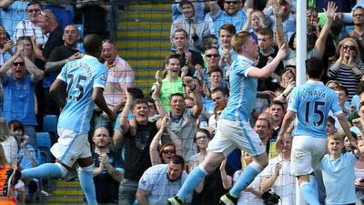 Kevin De Bruyne (C) of Manchester City celebrates after scoring against Arsenal during the Premier League match between Manchester City and Arsenal at the Etihad Stadium, Manchester, Britain, 8 May 2016. Nigel Roddis / EPA