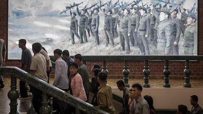 A Korean People's Army propaganda poster at a museum in Sinchon, south of Pyongyang. Ed Jones / AFP Photo / July 29, 2017