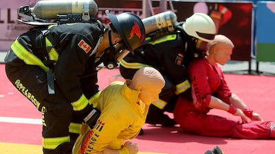 Canadian firefighters occupied five of the six top spots in the two main categories for men. Satish Kumar / The National