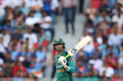 Pakistan middle-order batsman Shoaib Malik celebrates his 43rd fifty in one-day internationals. Chris Whiteoak / The National