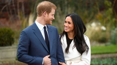 Prince Harry poses with Meghan Markle in the Sunken Garden of Kensington Palace, London, after announcing their engagement in 2017. Reuters