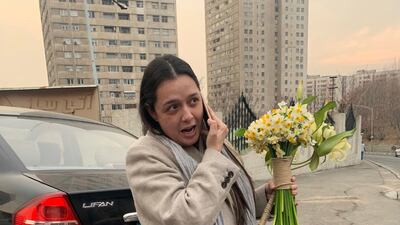 Prominent Iranian actress Taraneh Alidoosti speaks on a mobile phone after being released from Evin prison in Tehran. AP