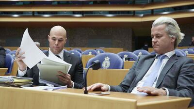 PVV party members Joram van Klaveren, left, and Geert Wilders, right. AFP