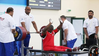 UAE’s Mohammed Khamis Khalaf competes at the IPC Powerlifting World Championships at the Dubai Club for the Disabled in Al Qusais. Pawan Singh / The National