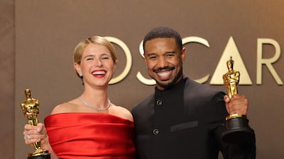 From left, Jessie Buckley, winner of the Best Actress Award for Hamnet, and Michael B. Jordan, winner of the Best Actor Award for Sinners, pose with their Oscars at Dolby Theatre in Hollywood, California. AFP