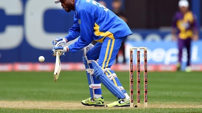 West Indies great Curtly Ambrose plays a shot off Wasim Akram during the legends T20 match on Saturday in New York City. Jewel Samad / AFP
