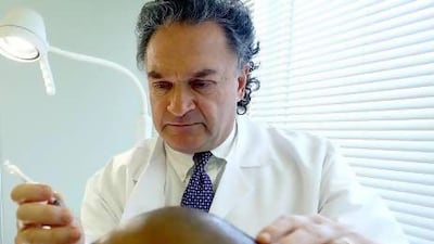 Dr George Lefkovits performs cosmetic surgery at the BodywoRx Aesthetic Clinic. Satish Kumar / The National