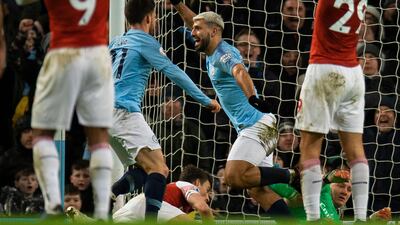 Aguero celebrates scoring the 3-1 goal. EPA