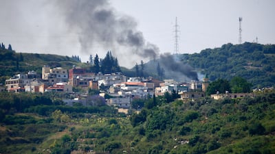 Smoke rises into the sky from the site that was targeted by Israeli airstrikes in Al Najjarieh village, south Lebanon, on May 17. EPA