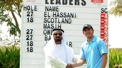 Greg Nicholson is congratulated by Mena organiser Mohamed Juma Buamaim.