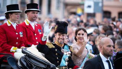 Crown Prince Frederik and Crown Princess Mary arrive by carriage at Christiansborg Castle on the Crown Prince's 50th birthday in 2018. EPA