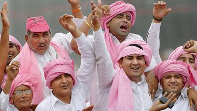 Farmers cheer as they listen to a speech by India's Congress party vice-president Rahul Gandhi (not pictured) at a farmers rally at Ramlila ground in New Delhi on April 19, 2015. Anindito Mukherjee/Reuters