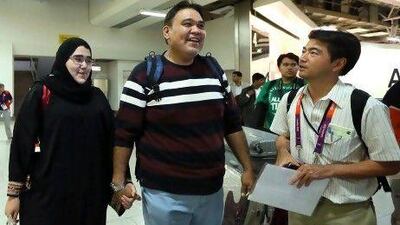 Wodjan Ali Seraj Abdulrahim Shahrkhani, left, is one of two female athletes to represent Saudi Arabia at the Olympics this year. Marwan Naamani / AFP