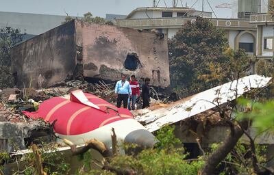 Officials survey the wreckage of the Air India Boeing 787 that crashed in Ahmedabad, killing 241 people on board. Getty Images