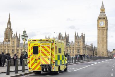 An ambulance crosses Westminster Bridge during a strike by junior doctors at St Thomas' Hospital in London, UK, on February 26. Bloomberg